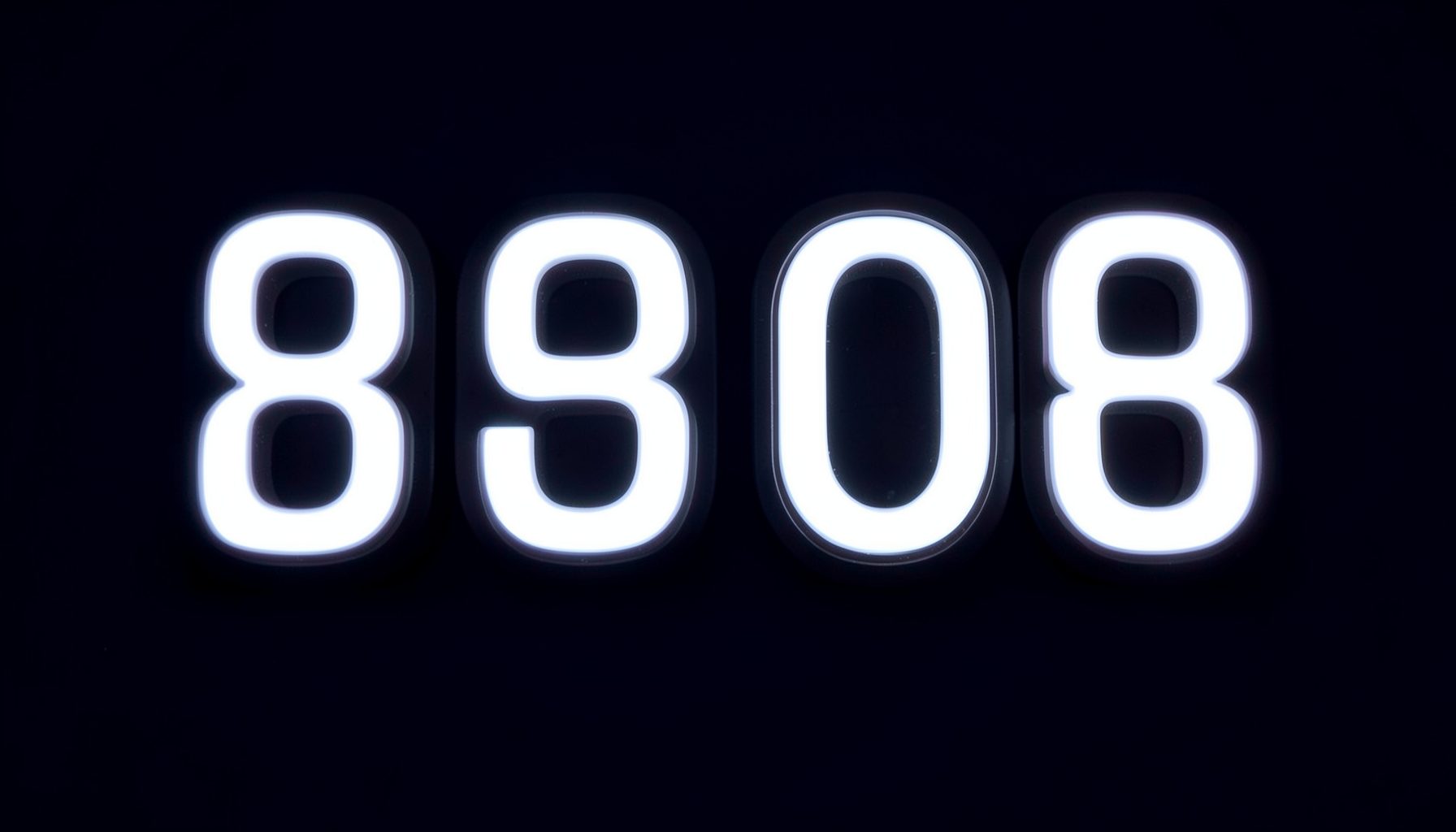 Illuminated scoreboard-style numbers glowing against a dark navy background, sharp and formal mood